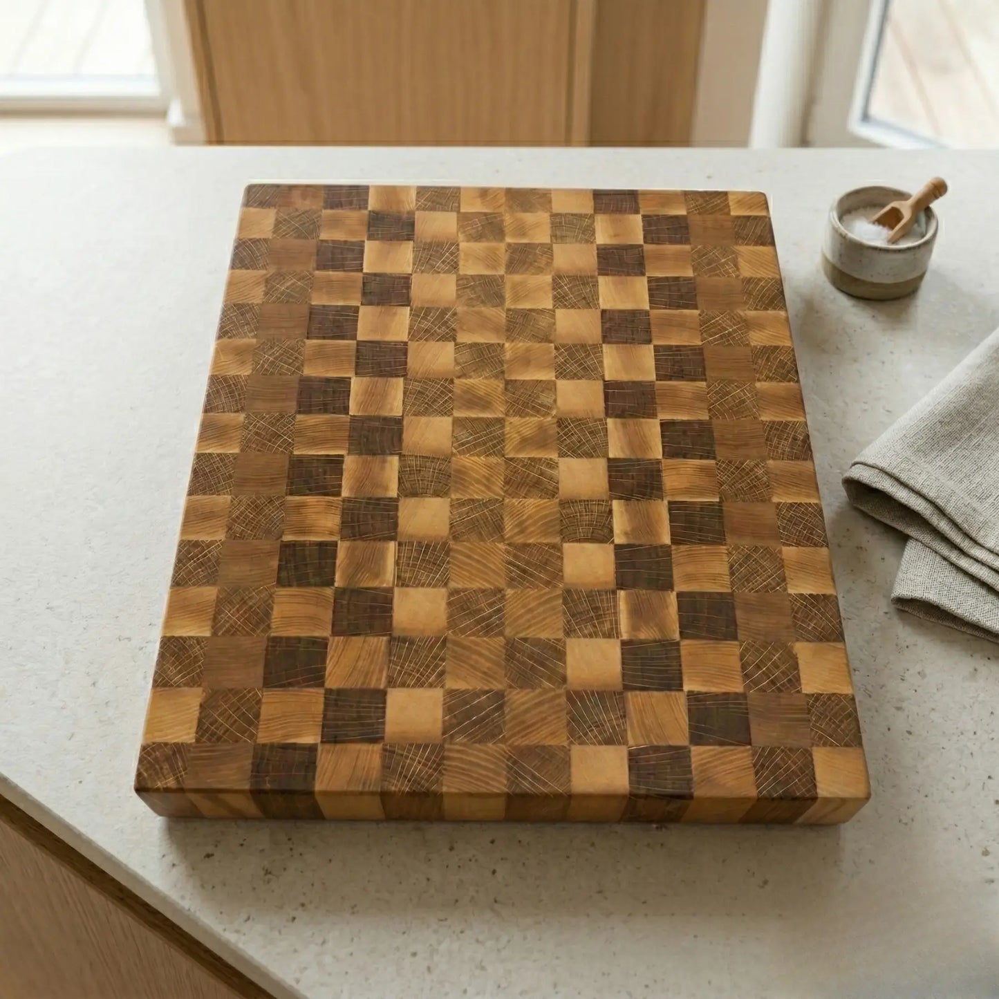 End grain wood cutting board 290x250 mm top down view showing the classic sapele and ash checkerboard design.