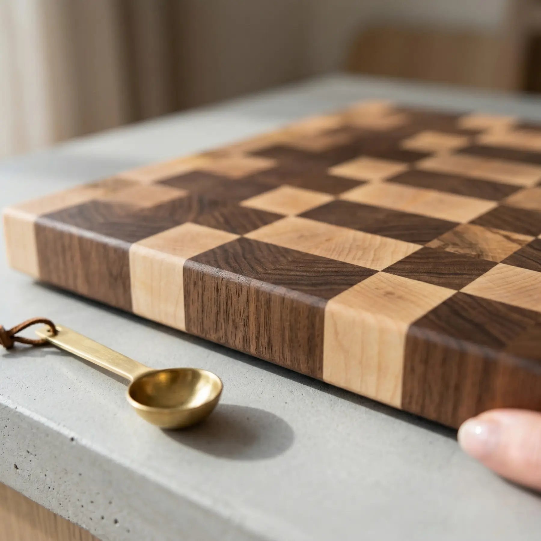 Handmade wooden chopping board 13.2x12.2 inch angled view highlighting the 35mm thickness and scattered chess design.