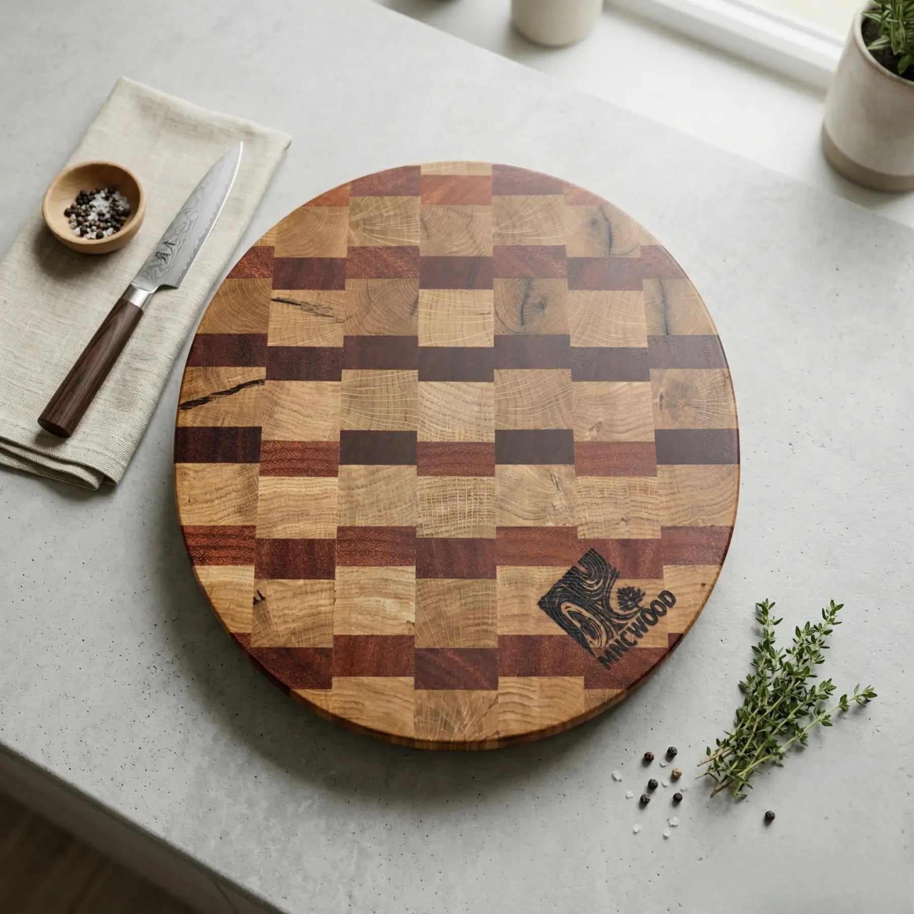 Heavy duty round charcuterie board 13.8 inch used for serving delicious cheese and snacks in a modern kitchen.