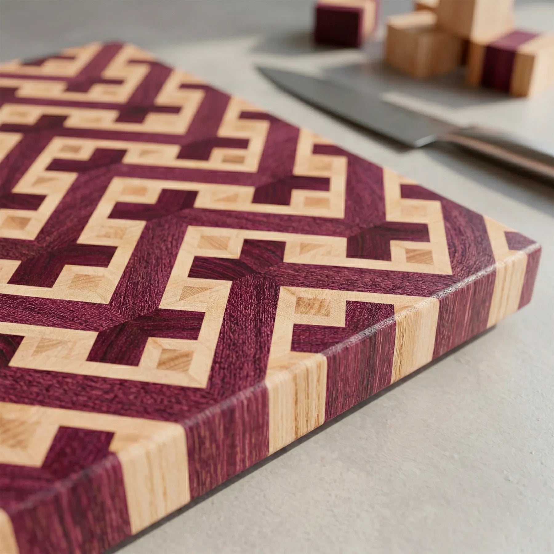 Purpleheart cutting board held in hand showing exotic wood colours