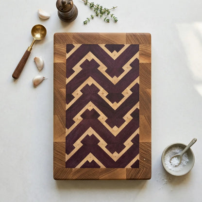 Small end-grain cutting board at angle showing V-shaped chevron pattern