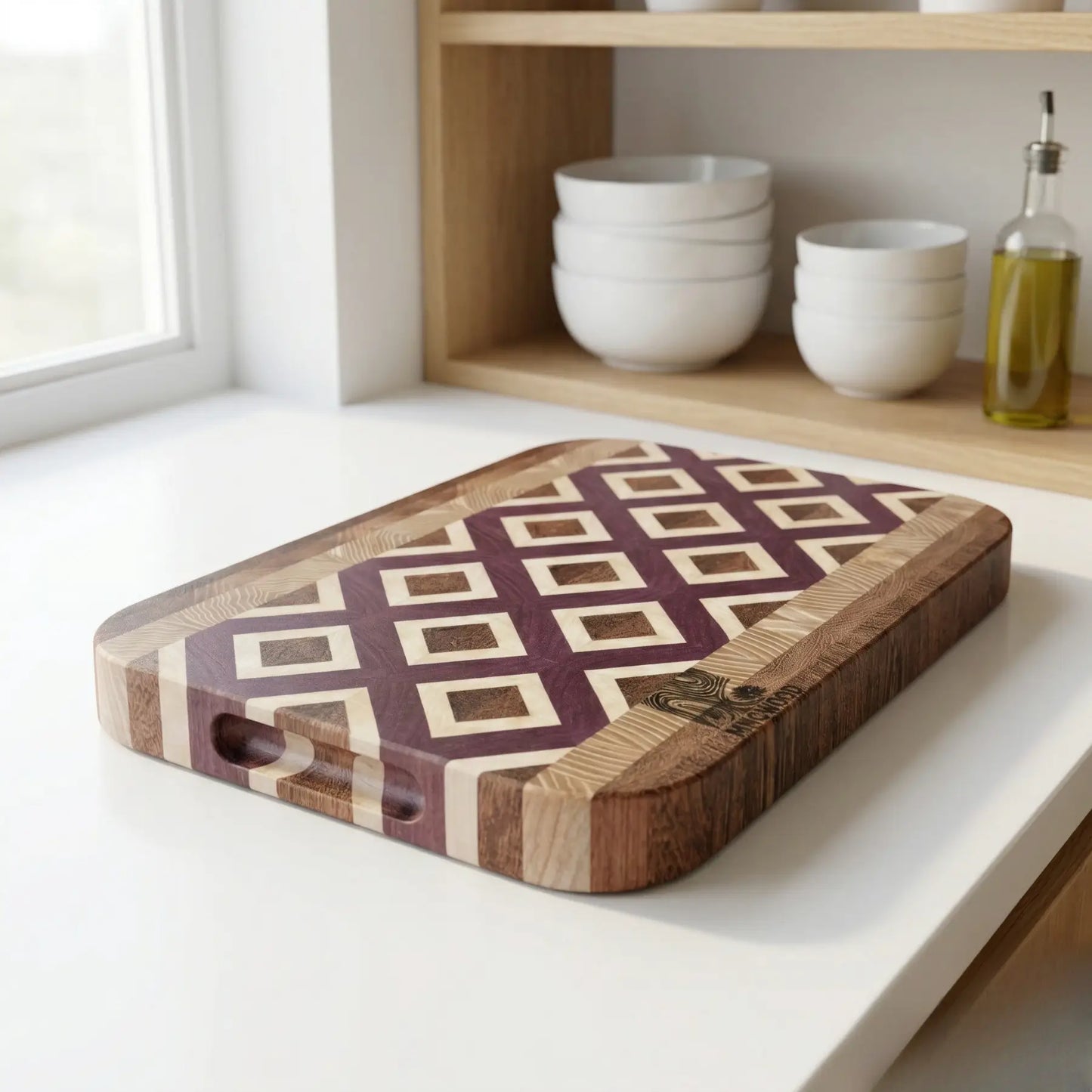 Luxury geometric wood cutting board styled in a modern rustic kitchen with an olive tree in the background.