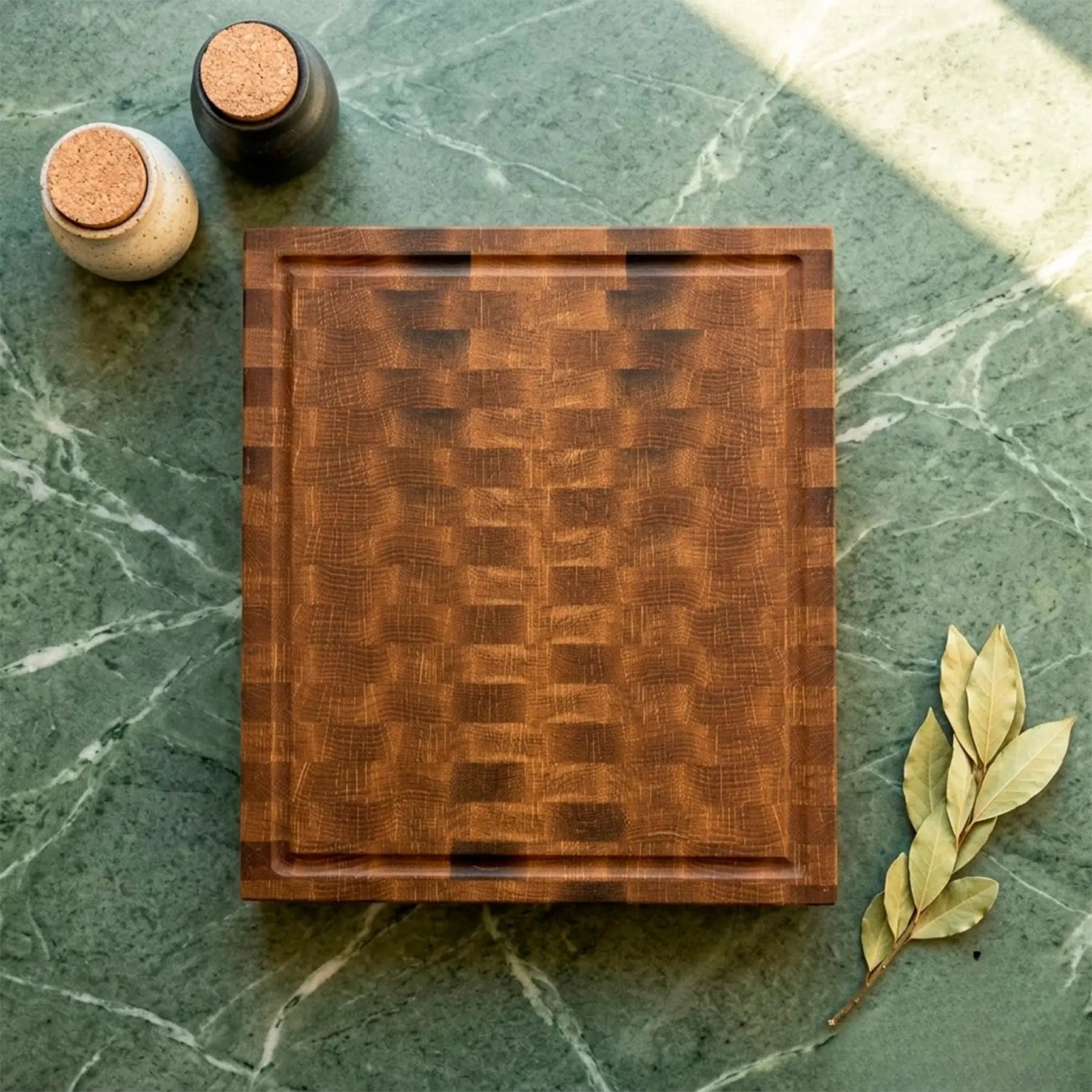 Oak cutting board 400mm with juice groove held in hand for scale