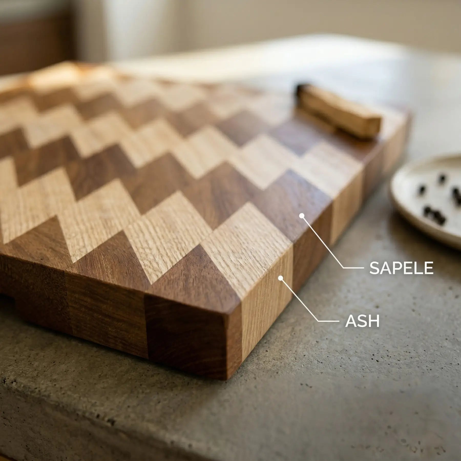 Luxury handmade wooden serving tray 370x350 mm resting on a kitchen island surrounded by fresh culinary tools.